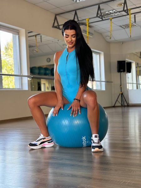Женский спортивный укороченный  комбинезон MANE с вырезом на спине и с push-up эффектом 1205 голубой 1205-блакитний-s фото